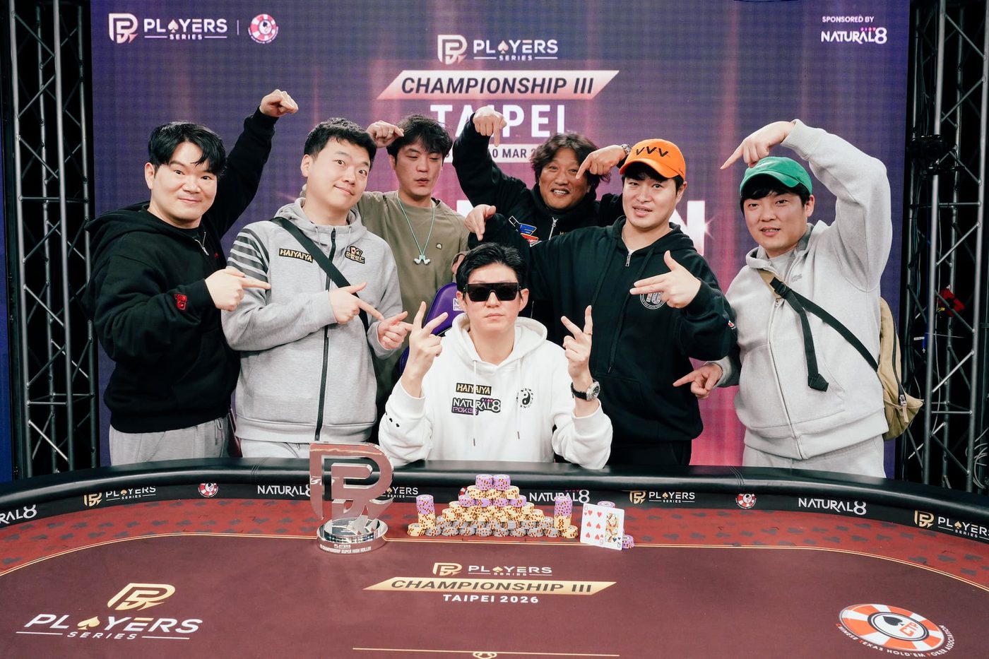 Photo: Kim Kiyoung celebrates with friends after winning the PS Championship Super High Roller